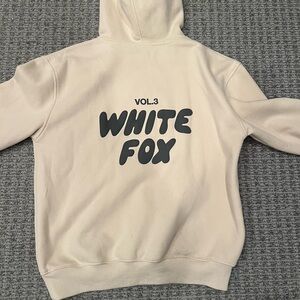 White Fox Boutique Beige Hoodie with Black Print